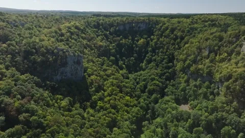 Aerial view of Cirque du Fer-a-Cheval natural amphitheater in Jura, France Stock Footage 341962368