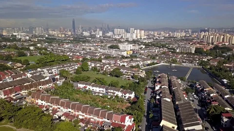 Aerial view of city development and suburbs from a drone in Kuala Lumpur. Видео 120769846
