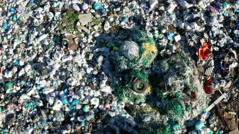 Aerial view of a city dump. The concept of pollution and excessive consumption. Stock Footage 168461375