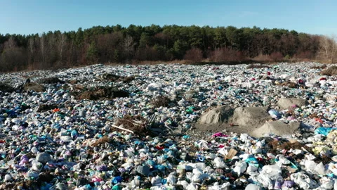 Aerial view of a city dump. The concept of pollution and excessive consumption. Stock Footage 168463513