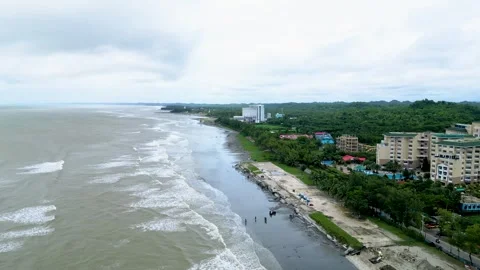 An aerial view of a city featuring a network of roads lined with hotels. The vib Video stock 287765318
