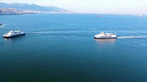 Aerial view of the city ferries docking at the pier in Izmir Stock Footage 242396595