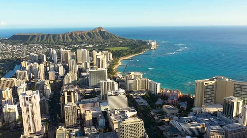 Aerial view city of Honolulu near the ocean Stock Footage