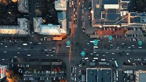 Aerial view of city intersection with many cars and GPS navigation system Stock Footage 122533998