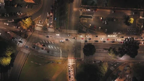 Aerial View of a City Intersection at Night With Traffic Flowing Stock Footage 281336170