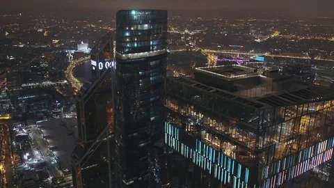 Aerial view of the city in the low clouds skyscrapers Moscow city at night Stock Footage 104301292