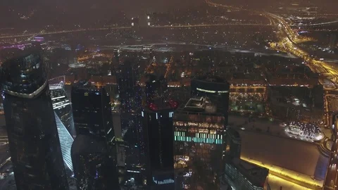 Aerial view of the city in the low clouds skyscrapers Moscow city at night Stock Footage 104301360