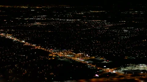 Aerial view of a city at night from a plane Stock Footage 1034503