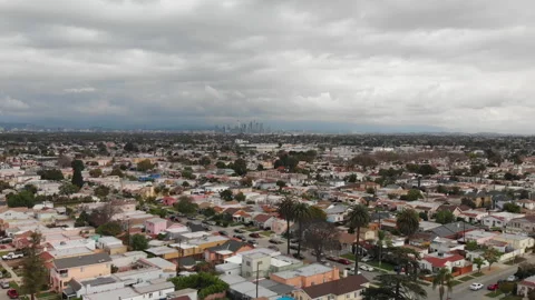 Aerial View of city revealing Downtown Los Angeles Skyline In Background Stock Footage