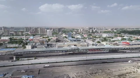 Aerial view of  city skyline of Qinghai-Tibet Railway Station in Golmud, china Video stock 307017853