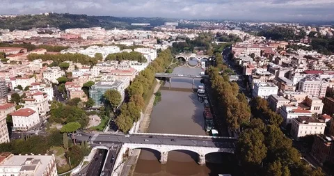 Aerial view of the city, Tiber river and Ponte Matteotti bridge Stock Footage 98559727