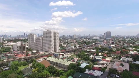 AERIAL VIEW OF CITY WITH TRAIN Stock Footage