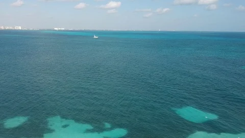 A aerial view of the city while a boat passes by Stock Footage 87242848