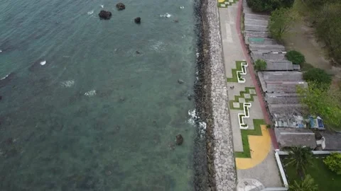 Aerial View of Clean Beach with Rocks in... | Stock Video | Pond5