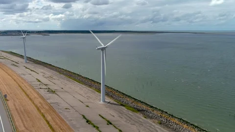 Aerial view of clean power generating wind turbines. 스톡 동영상 275039105