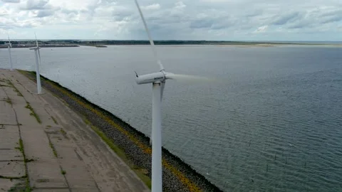 Aerial view of clean power generating wind turbines. Video stock 275267904