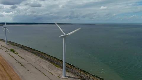 Aerial view of clean power generating wind turbines. 스톡 동영상 275278854