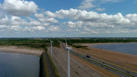 Aerial view of clean power generating wind turbines. 스톡 동영상 275282427