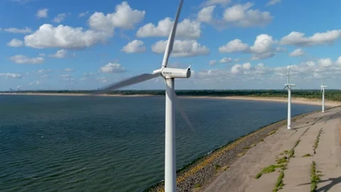 Aerial view of clean power generating wind turbines. Stock Footage 275287691