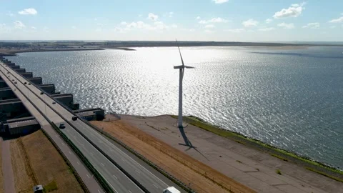 Aerial view of clean power generating wind turbines. Stock Footage 275289028