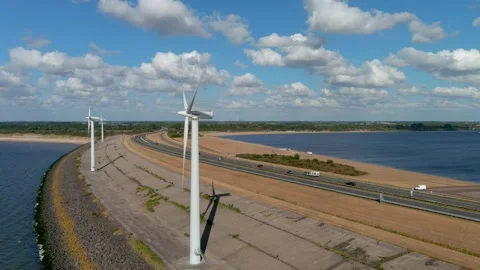Aerial view of clean power generating wind turbines. Stock Footage 275291158