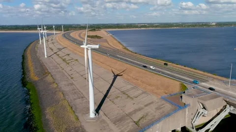 Aerial view of clean power generating wind turbines. Video stock 275292296