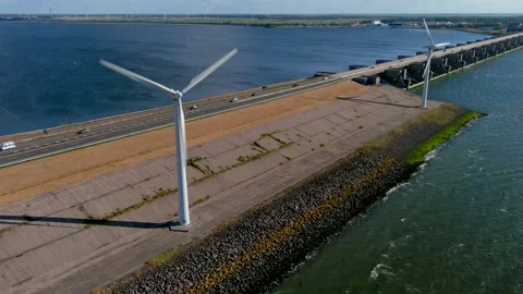 Aerial view of clean power generating wind turbines. Stock Footage 275294516