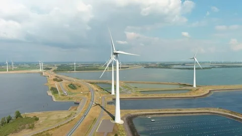 Aerial view of clean power generating wind turbines. 動画素材 275296937