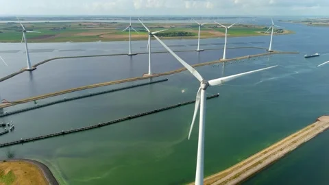 Aerial view of clean power generating wind turbines. Video stock 275297305