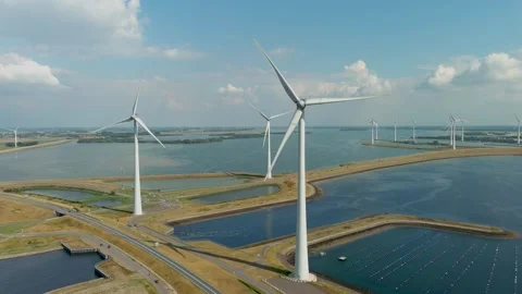 Aerial view of clean power generating wind turbines. Video stock 275299049