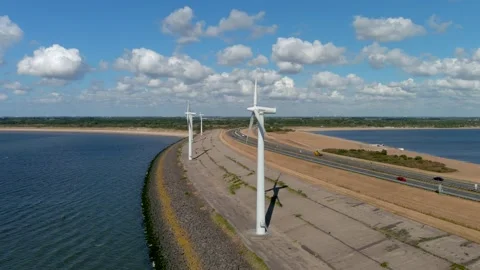 Aerial view of clean power generating wind turbines. Video stock 275299709