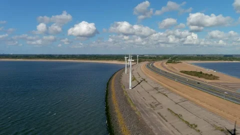 Aerial view of clean power generating wind turbines. Video stock 275336673
