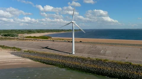 Aerial view of clean power generating wind turbines. Stock Footage 275337504