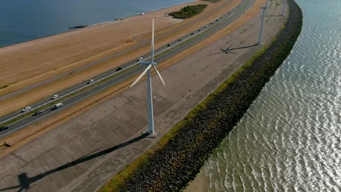 Aerial view of clean power generating wind turbines. Video stock 275343079