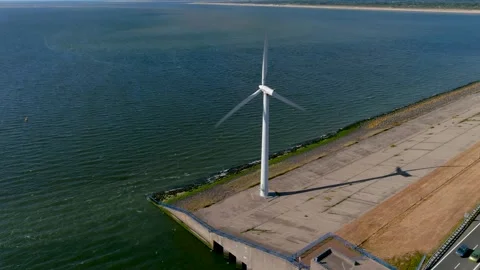 Aerial view of clean power generating wind turbines. Видео 275344308