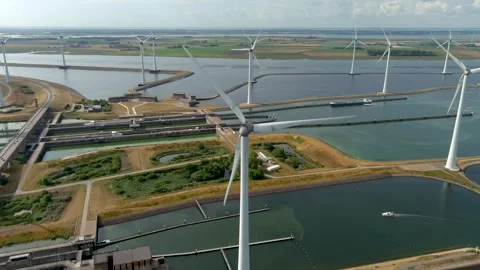 Aerial view of clean power generating wind turbines. Video stock 275431190