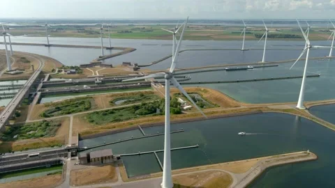 Aerial view of clean power generating wind turbines. Stock Footage 275437461