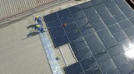 Aerial View Of Cleaning Solar Panels On The Roof Stock Footage