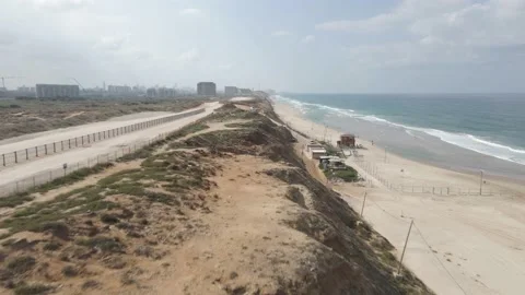 Aerial view - the cliff beach  before lockdown Stock Footage 228062195