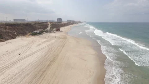Aerial view - the cliff beach  before lockdown Stock Footage 228064604