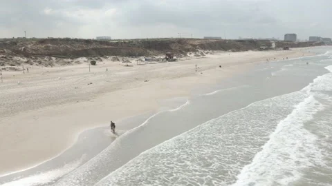 Aerial view - the cliff beach  before lockdown Stock Footage 228066122