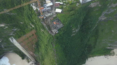 Aerial View Of Cliff Construction And Glass Elevator At Kelingking Beach Bali Stock Footage 336489113