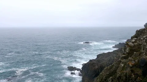 Aerial view of a cliff edge, Land's End, Cornwall, England, UK, 4K footage video Stock Footage 77921653