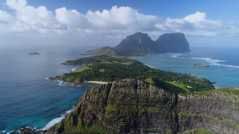 Aerial view of cliff face with overview of Lord Howe Island,NSW,Australia Stock Footage 93180059