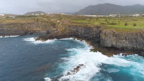 Aerial view of cliffs and Atlantic ocean on Tenerife, drone shot from above Stock Footage 97710242