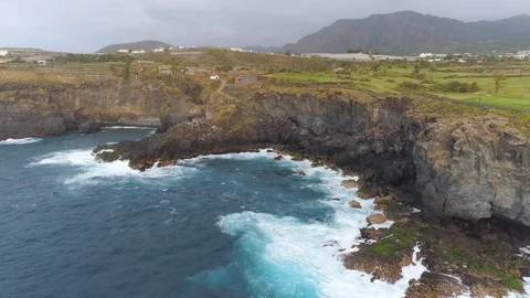 Aerial view of cliffs and Atlantic ocean on Tenerife, drone shot from above Stock Footage 97710474