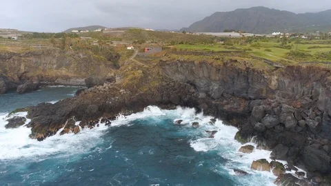 Aerial view of cliffs and Atlantic ocean on Tenerife, drone shot from above Stock Footage 97710591