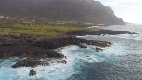 Aerial view of cliffs and Atlantic ocean on Tenerife, drone shot from above Stock Footage 97710701