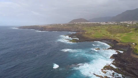 Aerial view of cliffs and Atlantic ocean on Tenerife, drone shot from above Stock Footage 97711468