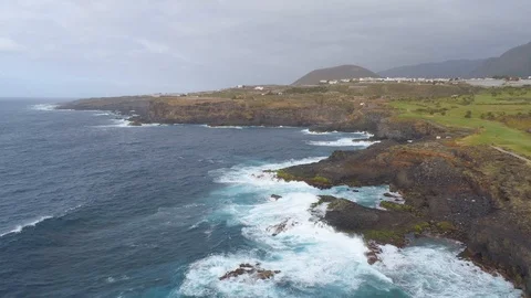 Aerial view of cliffs and Atlantic ocean on Tenerife, drone shot from above Stock Footage 97711853